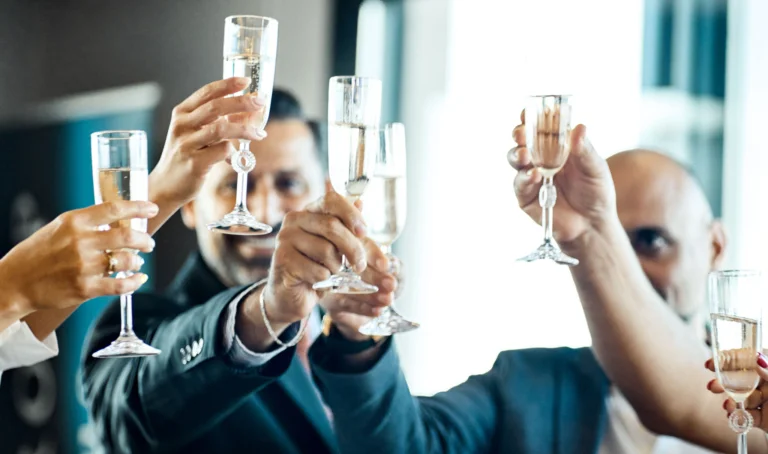 Hibarr team celebration toast at an office event